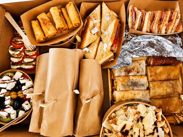 A selection of toasted sandwiches, wraps and salads